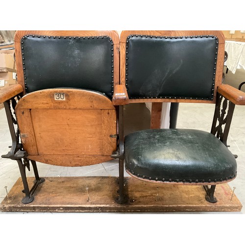 202 - PAIR OF VINTAGE FOLDING OAK AND CAST IRON THEATRE SEATS