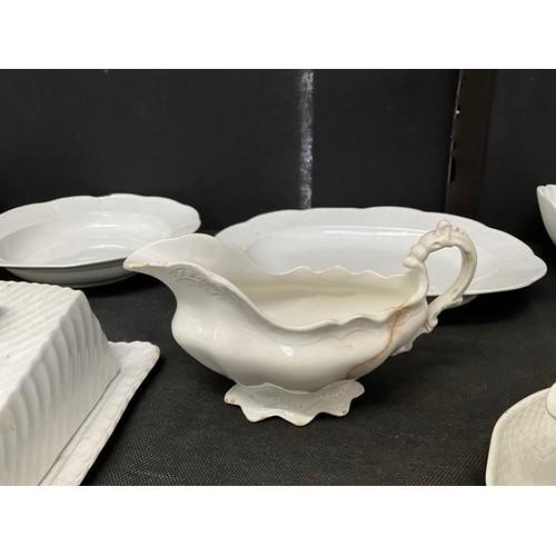 8 - A LARGE WHITE DINNER SERVICE TO INCLUDE DINNER PLATES TEA PLATES BOWLS CHEESE DISH ETC