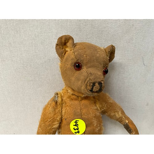 68 - EARLY JOINTED TEDDY BEAR WITH GLASS EYES A/F