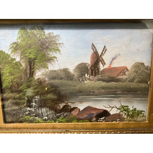 69 - A VICTORIAN GILT FRAMED OILS UNDER GLASS (WINDMILL OVERLOOKING LAKE)