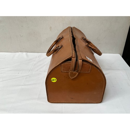 79 - A VINTAGE LEATHER HOLDHALL