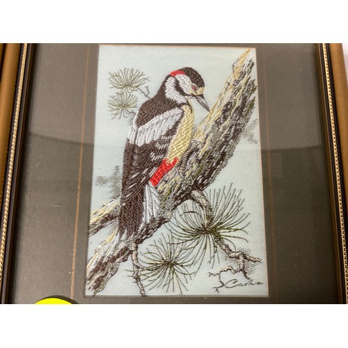 139 - A SET OF FOUR FRAMED SILK BIRD PICTURES