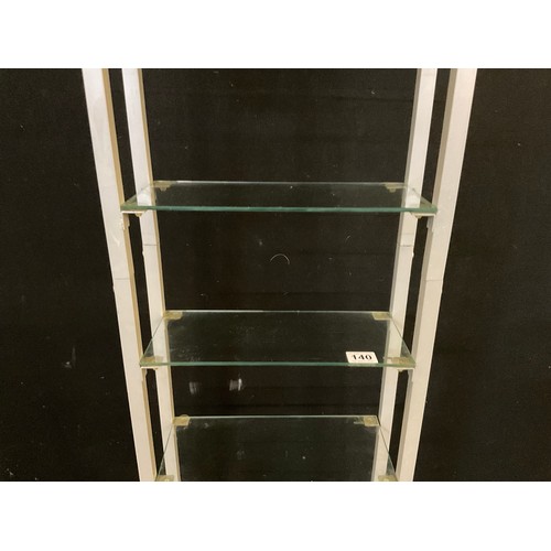 140 - A METAL FRAMED SHOP DISPLAY SHELF WITH GLASS SHELVES H71” L16” D6”