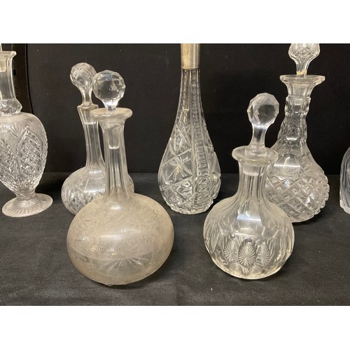 141 - A BOX OF GLASS DECANTERS TO ICNCLUDE CONTINENTAL (800) COLLARED EXAMPLE