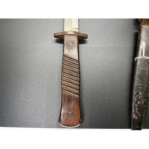 207 - A VINTAGE DAGGER IN SHEATH