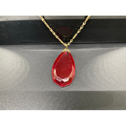 235 - HALLMARKED 9CT GOLD CHAIN WITH RED PENDANT 
 (CHAIN W 6G) L10”