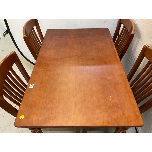 259 - MODERN MAHOGANY TABLE AND 4 MATCHING CHAIRS H29