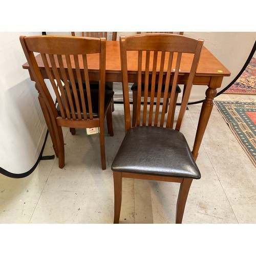 259 - MODERN MAHOGANY TABLE AND 4 MATCHING CHAIRS H29