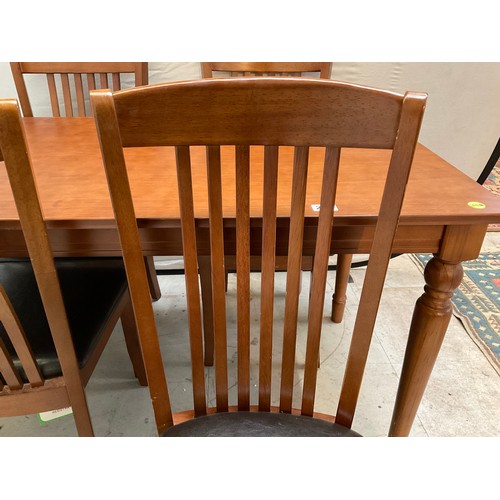 259 - MODERN MAHOGANY TABLE AND 4 MATCHING CHAIRS H29