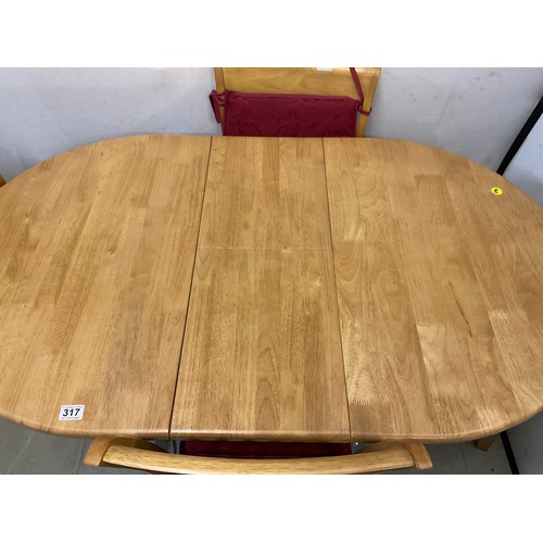 317 - MODERN BEECH EXTENDING TABLE AND 4 MATCHING CHAIRS H29