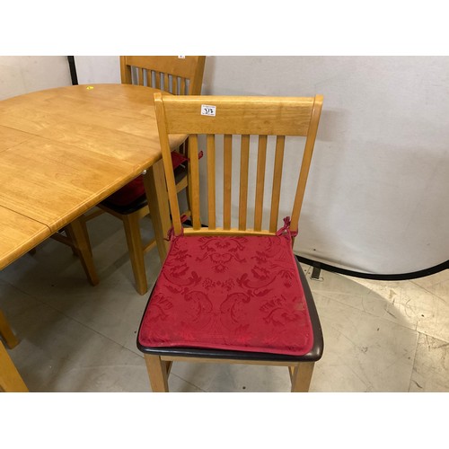 317 - MODERN BEECH EXTENDING TABLE AND 4 MATCHING CHAIRS H29