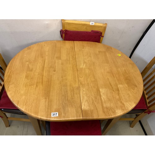 317 - MODERN BEECH EXTENDING TABLE AND 4 MATCHING CHAIRS H29