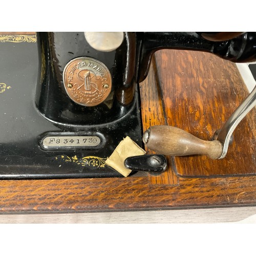 24 - VINTAGE SINGER HAND SEWING MACHINE IN CASE