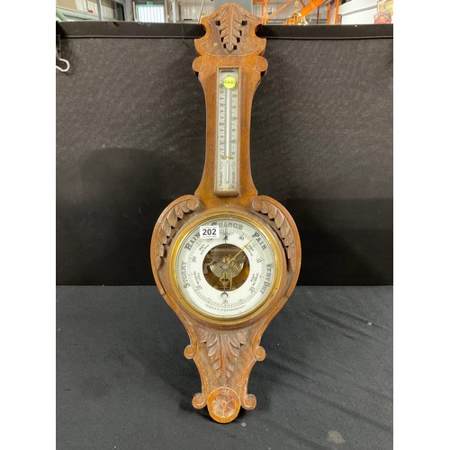 202 - CARVED OAK VINTAGE WALL BAROMETER H32”