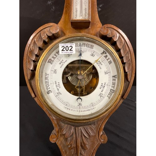 202 - CARVED OAK VINTAGE WALL BAROMETER H32”