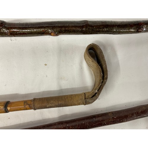 28 - 3 VINTAGE WALKING STICKS AND RIDING CROP