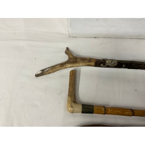 28 - 3 VINTAGE WALKING STICKS AND RIDING CROP
