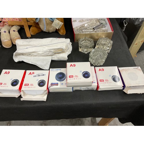 71 - BOX OF ODDS TO INCLUDE MANTLE CLOCK, PETER RABBIT TOY, WIFI CAMERAS IN BOXES, DOLL ETC