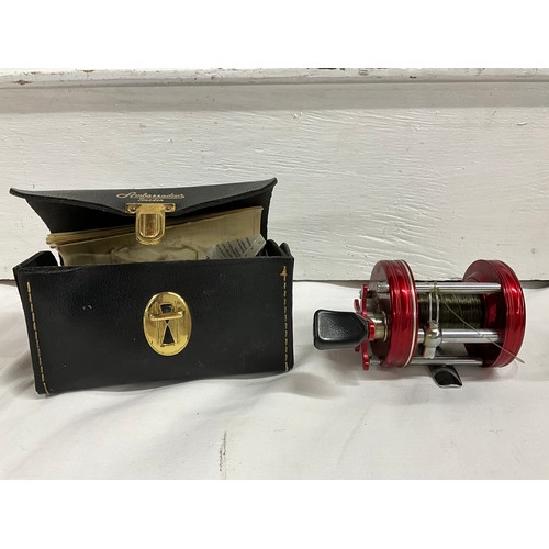 91 - ABU AMBOSSADEUR 6000 MULTIPLYER REEL IN CASE AND A VINTAGE MITCHELL 300 REEL IN ORIGINAL BOX WITH SP... 
