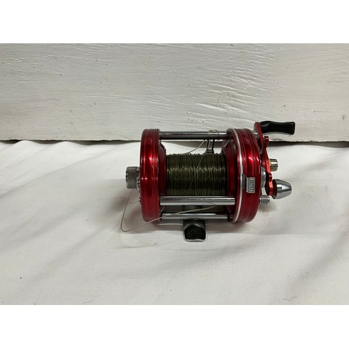 91 - ABU AMBOSSADEUR 6000 MULTIPLYER REEL IN CASE AND A VINTAGE MITCHELL 300 REEL IN ORIGINAL BOX WITH SP... 