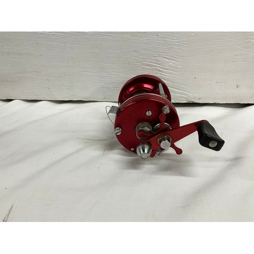 91 - ABU AMBOSSADEUR 6000 MULTIPLYER REEL IN CASE AND A VINTAGE MITCHELL 300 REEL IN ORIGINAL BOX WITH SP... 
