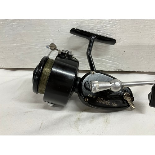 91 - ABU AMBOSSADEUR 6000 MULTIPLYER REEL IN CASE AND A VINTAGE MITCHELL 300 REEL IN ORIGINAL BOX WITH SP... 
