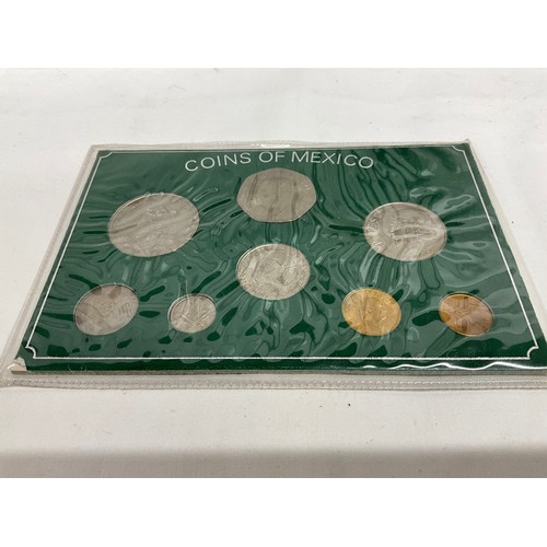 104 - A QUANTITY OF MIXED FORIEGN COINAGE