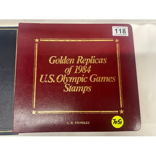 118 - ALBUM OF GOLDEN REPLICAS OF 1984 US OLYMPIC GAMES STAMPS AND A THE COMMON WEALTH COLLECTIONS ALBUM