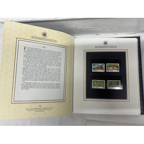 118 - ALBUM OF GOLDEN REPLICAS OF 1984 US OLYMPIC GAMES STAMPS AND A THE COMMON WEALTH COLLECTIONS ALBUM