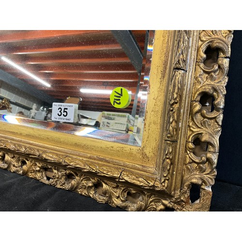 35 - EDWARDIAN GILT FRAMED BEVEL EDGE WALL MIRROR A/F 18”X29.5”