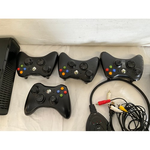 34 - XBOX 360 WITH CONTROLLERS AND BOX OF GAMES