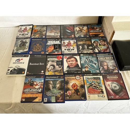 34 - XBOX 360 WITH CONTROLLERS AND BOX OF GAMES