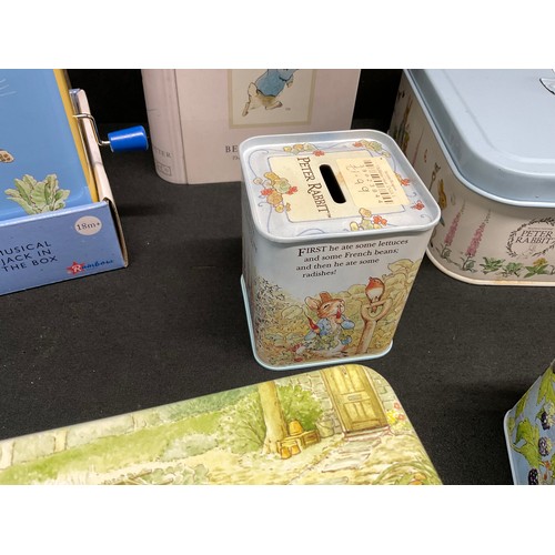 124 - LARGE COLLECTION OF BEATRIX POTTER PETER RABBIT TINS TO INCLUDE JACK IN THE BOX ETC