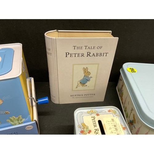 124 - LARGE COLLECTION OF BEATRIX POTTER PETER RABBIT TINS TO INCLUDE JACK IN THE BOX ETC