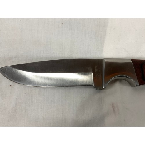 132 - MODERN HUNTING  KNIFE IN SHEATH HERBERTZ