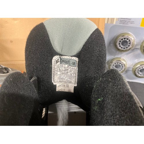 162 - BOXED PAIR OF ROLLER BOOTS WITH SPARE ROLLERS