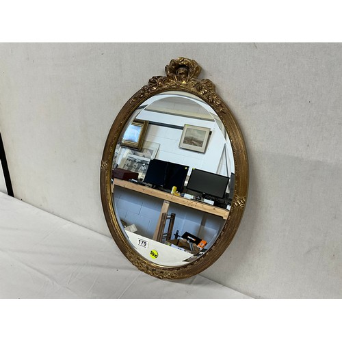 179 - VINTAGE GILT FRAMED OVAL WALL MIRROR 23