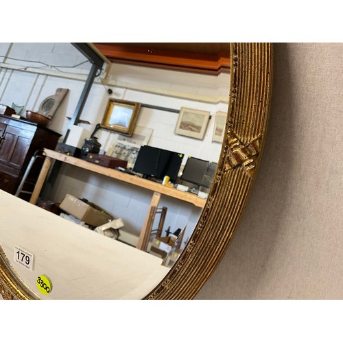 179 - VINTAGE GILT FRAMED OVAL WALL MIRROR 23