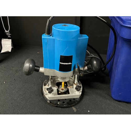 CASED POWER BASE ELEC ROUTER AND BOXED SKIL CIRCULAR SAW