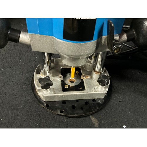 CASED POWER BASE ELEC ROUTER AND BOXED SKIL CIRCULAR SAW