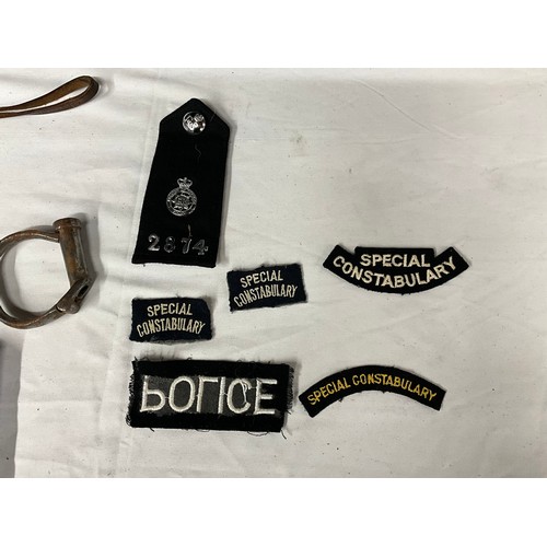 251 - VINTAGE POLICEMANS CLOAK TRUNCHEON HAND CUFFS ETC