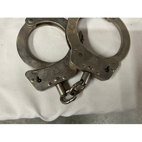 251 - VINTAGE POLICEMANS CLOAK TRUNCHEON HAND CUFFS ETC