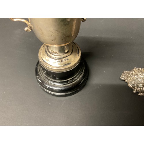 77 - SMALL HALLMARKED SILVER TROPHY AND BROOCH TOTAL SILVER WIEGHT 36G
