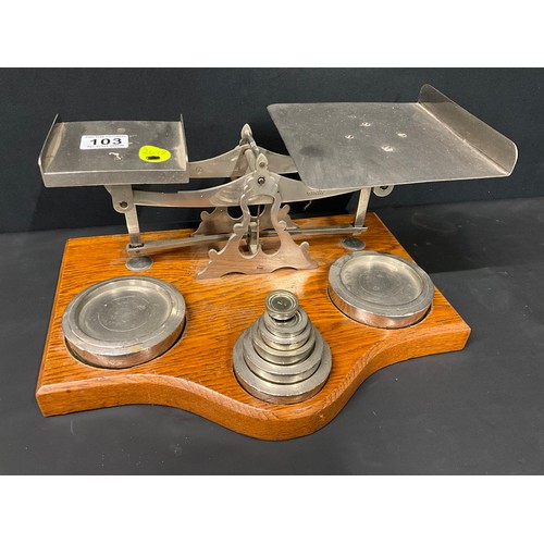 103 - LARGE SET OF EDWARDIAN  PARCEL SCALES AND WEIGHTS ON OAK BASE