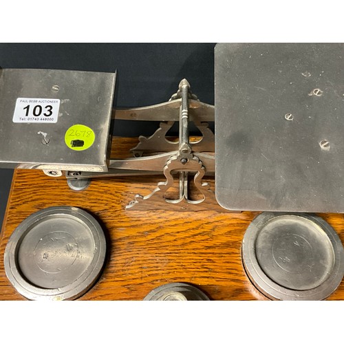 103 - LARGE SET OF EDWARDIAN  PARCEL SCALES AND WEIGHTS ON OAK BASE