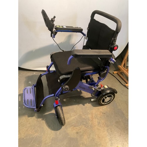 233 - MOTION HEALTH CARE ELECTRIC WHEEL CHAIR COMPLETE WITH CHARGER