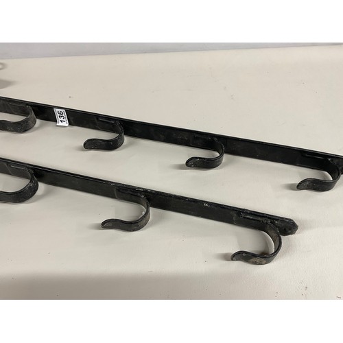 136 - PAIR OF METAL GUN RACKS 35