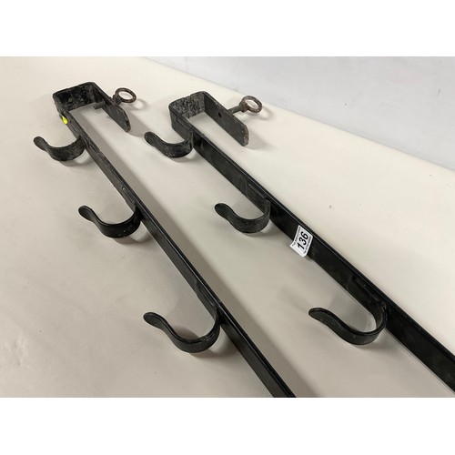 136 - PAIR OF METAL GUN RACKS 35