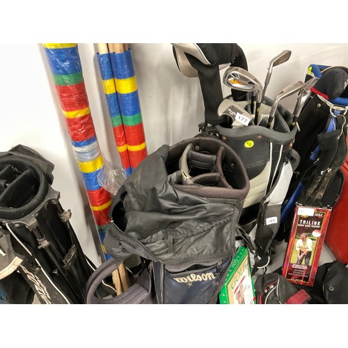 177 - 2 GOLF BAGS AND CLUBS, VINTAGE SUITCASE, WINDBREAKS BAGS, BACKPACKS ETC