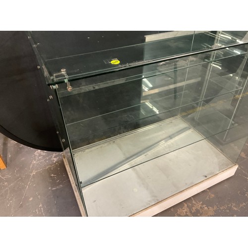 216 - LARGE GLASS SHOP DISPLAY UNIT WITH GRADUATED FITTED SHELVES H37